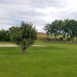 Panoramic view of a lush green golf course at Meadowbrook Golf Course. Smooth