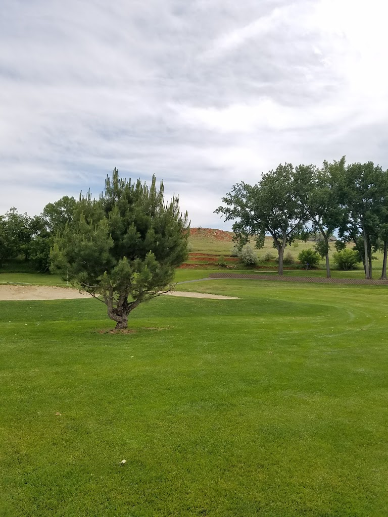 Panoramic view of a lush green golf course at Meadowbrook Golf Course. Smooth