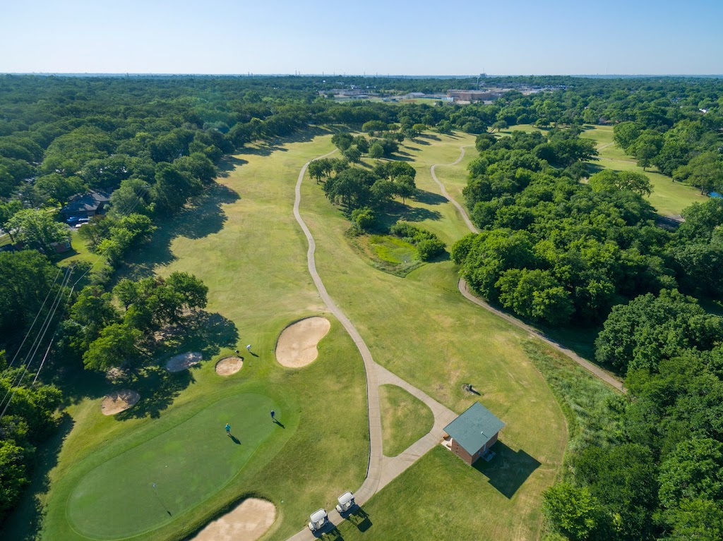 Panoramic view of a lush green golf course at Meadowbrook Golf Course. Smooth