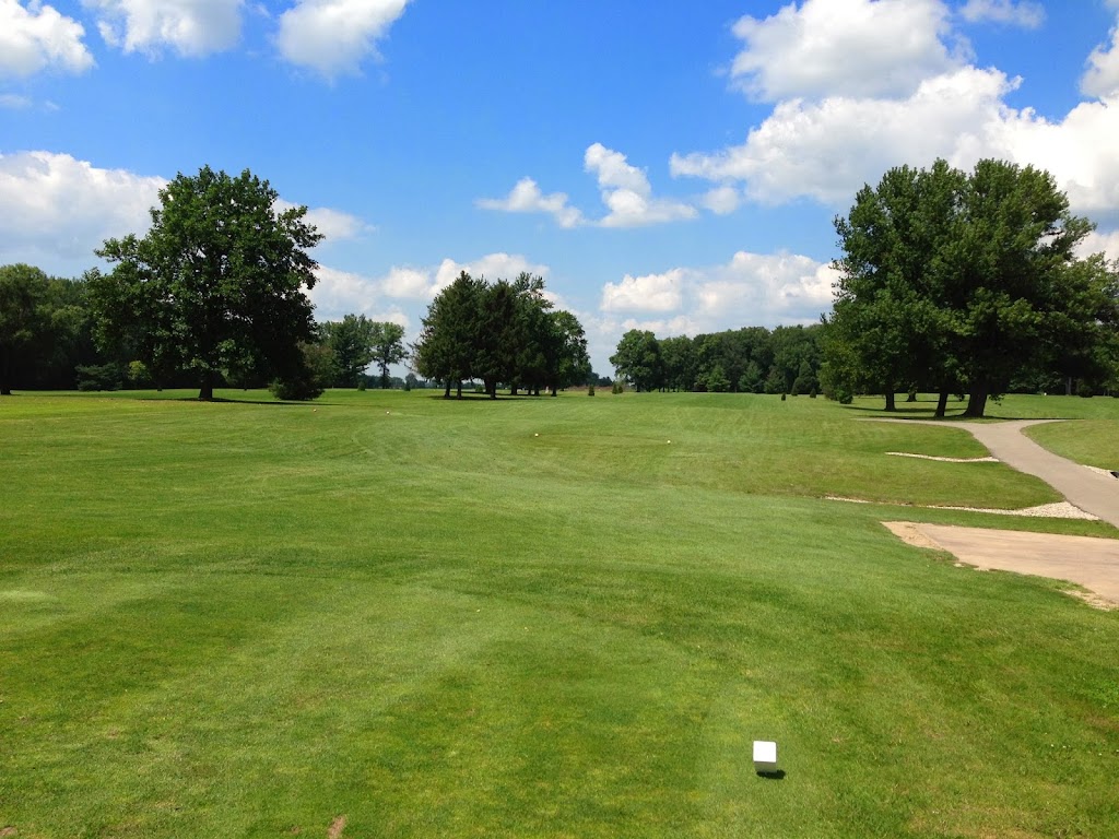 Panoramic view of a lush green golf course at Memorial Park Golf Course. Smooth