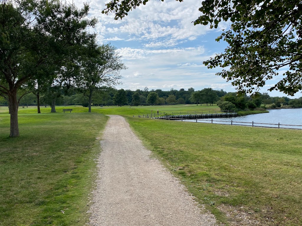 Panoramic view of a lush green golf course at Merrick Golf Course. Smooth