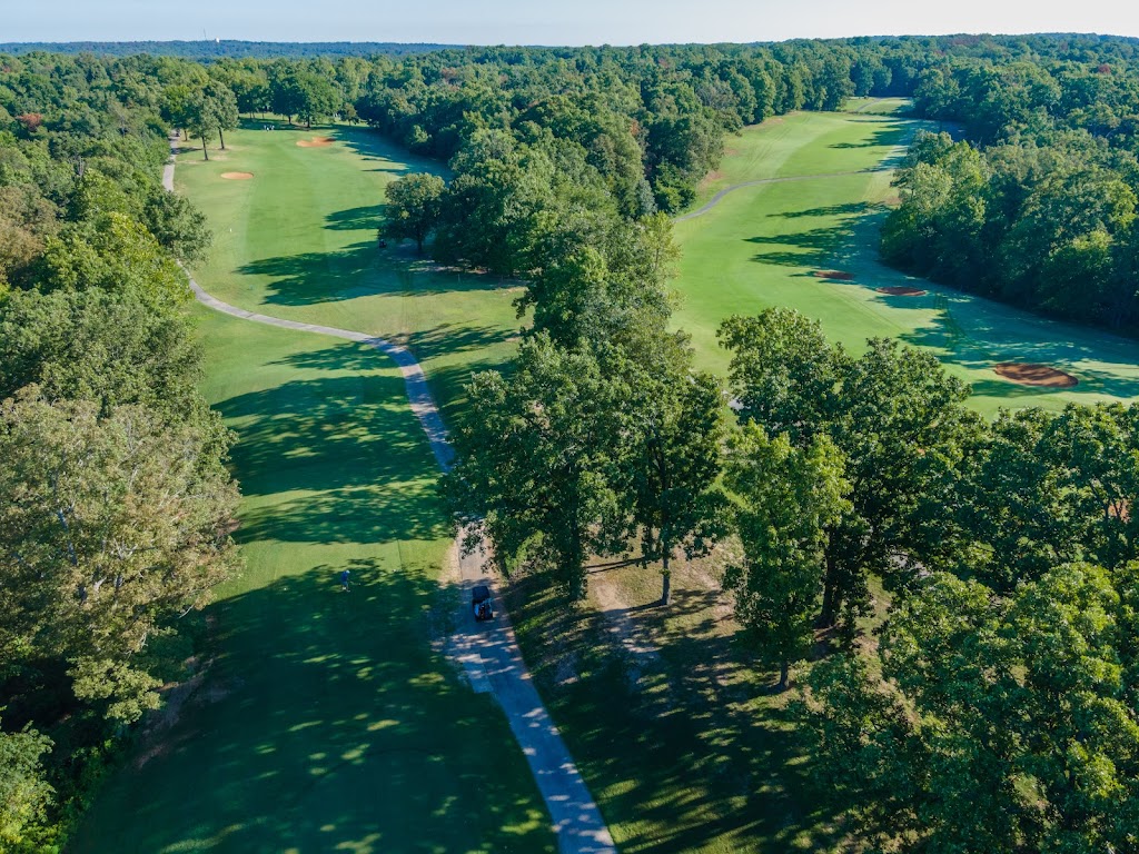 Panoramic view of a lush green golf course at Metfield Golf Complex (Dogwood/Brittany). Smooth