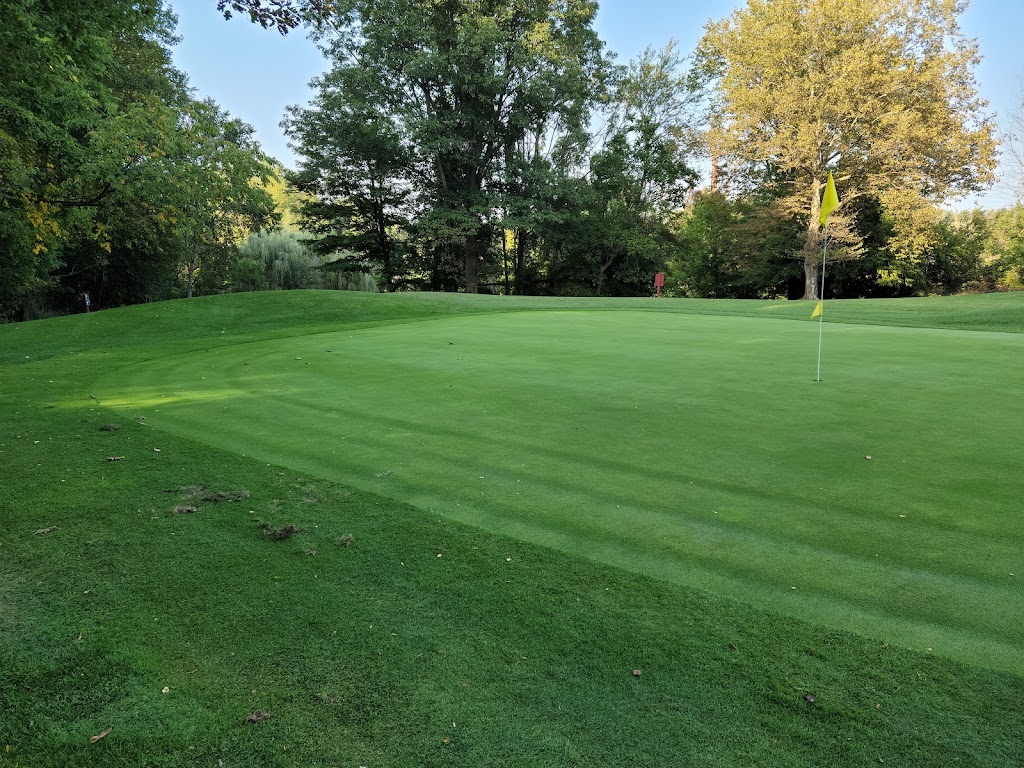 Panoramic view of a lush green golf course at Michigan City Municipal Golf Course - North. Smooth