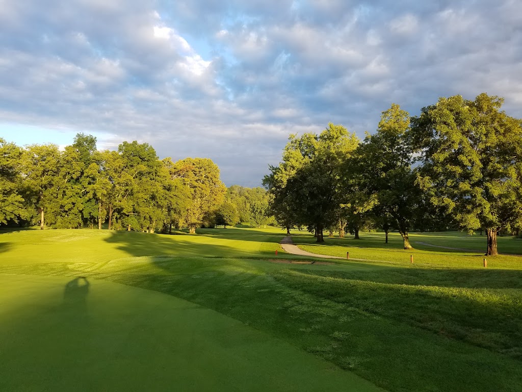 Panoramic view of a lush green golf course at Midland Trail Golf Club. Smooth