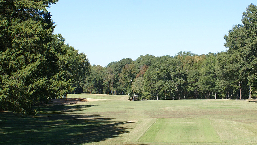Panoramic view of a lush green golf course at Mill Quarter Plantation Golf Club. Smooth