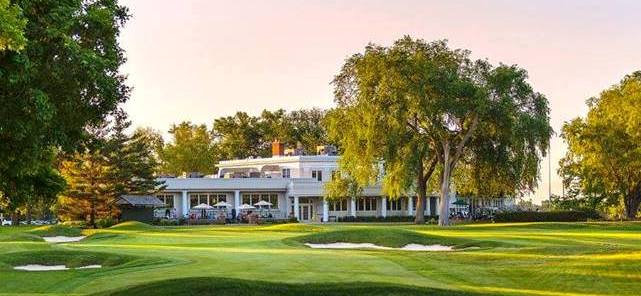 Panoramic view of a lush green golf course at Minneapolis Golf Club. Smooth