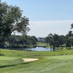 Panoramic view of a lush green golf course at Minnesota Valley Country Club. Smooth