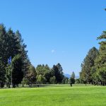 Panoramic view of a lush green golf course at Missoula Country Club. Smooth