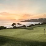 Panoramic view of a lush green golf course at Monarch Beach Golf Links. Smooth