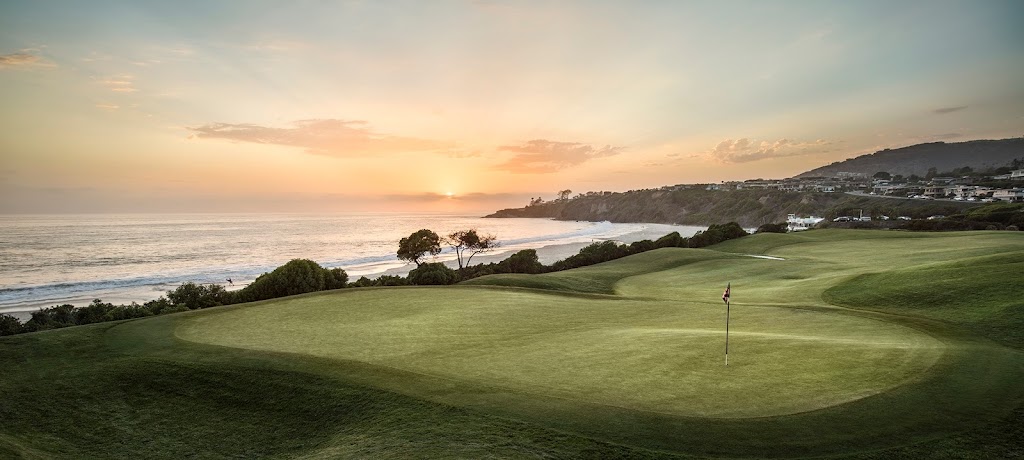 Panoramic view of a lush green golf course at Monarch Beach Golf Links. Smooth