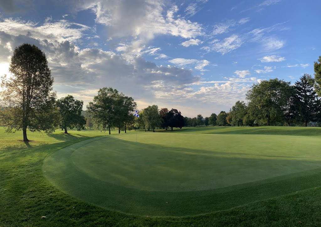 Panoramic view of a lush green golf course at Monroe Golf Club. Smooth