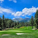 Panoramic view of a lush green golf course at Montreux Golf & Country Club. Smooth
