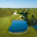 Panoramic view of a lush green golf course at Moselem Springs Golf Club. Smooth