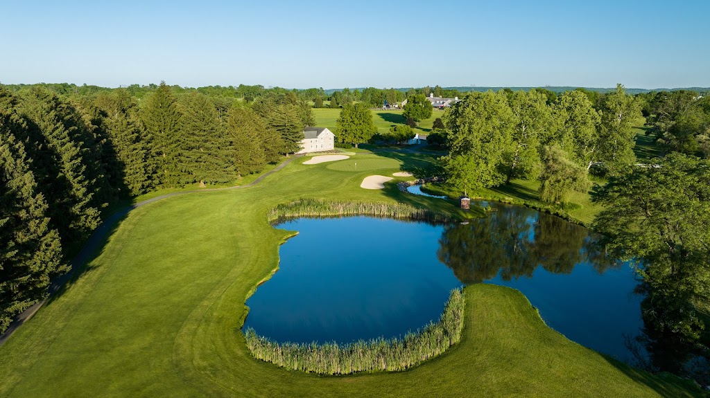 Panoramic view of a lush green golf course at Moselem Springs Golf Club. Smooth
