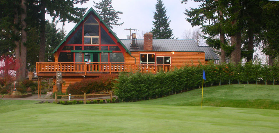 Panoramic view of a lush green golf course at Mount Si Golf Course. Smooth