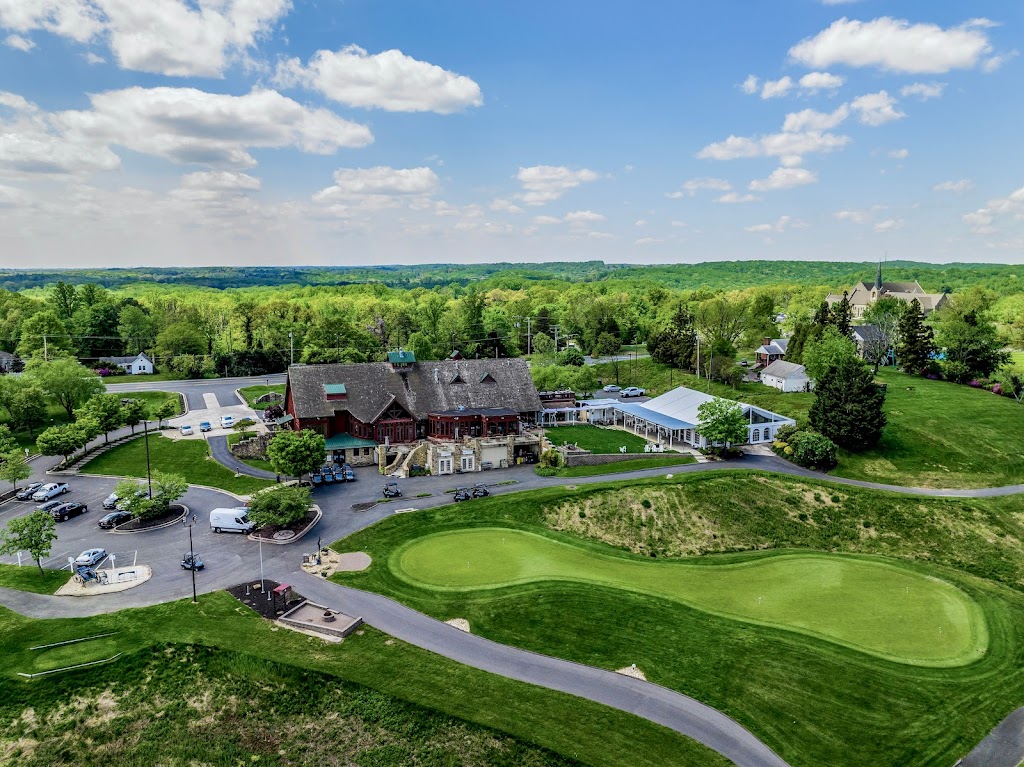 Panoramic view of a lush green golf course at Mountain Branch. Smooth