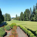 Panoramic view of a lush green golf course at Mountain View Golf Course. Smooth
