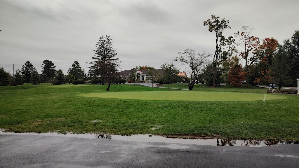 Panoramic view of a lush green golf course at Mountain View Golf Course. Smooth