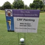 green grass with the flag in the hole.