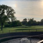 Panoramic view of a lush green golf course at Mt. Prospect Golf Club. Smooth