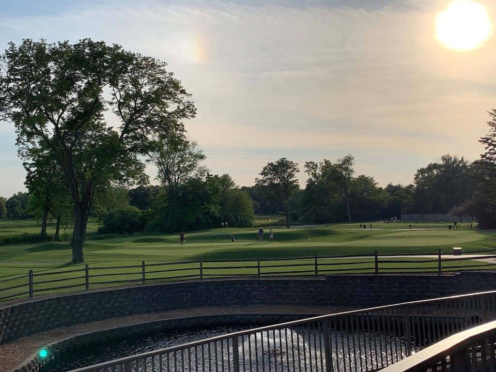 Panoramic view of a lush green golf course at Mt. Prospect Golf Club. Smooth