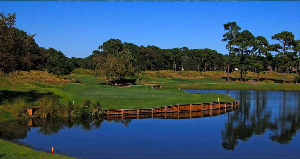 Panoramic view of a lush green golf course at Myrtle Beach Golf Trail. Smooth