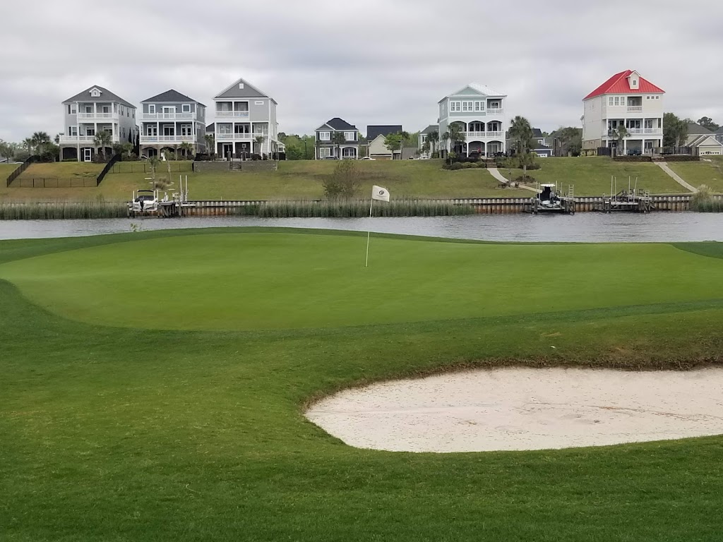 Panoramic view of a lush green golf course at Myrtlewood Golf Club. Smooth