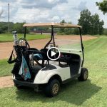 Panoramic view of a lush green golf course at Naga-Waukee War Memorial Golf Course. Smooth