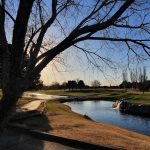 Panoramic view of a lush green golf course at Nancy Lopez Golf Course at Spring River. Smooth