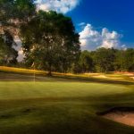 Panoramic view of a lush green golf course at Nashville Golf & Athletic Club. Smooth
