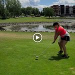 green grass with the flag in the hole.
