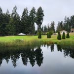 Panoramic view of a lush green golf course at Nile Shrine Golf Course. Smooth