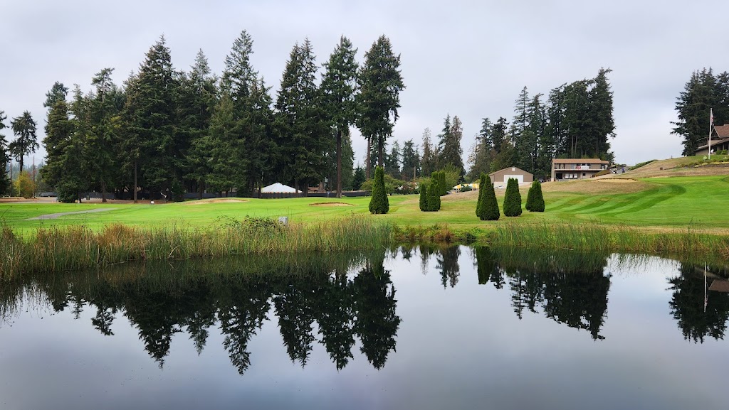 Panoramic view of a lush green golf course at Nile Shrine Golf Course. Smooth