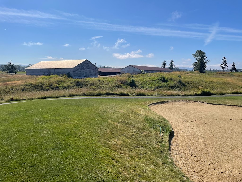 Panoramic view of a lush green golf course at North Bellingham Golf Course. Smooth