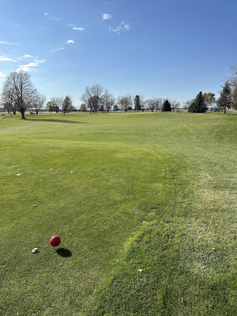 Panoramic view of a lush green golf course at North Bend Golf Course. Smooth