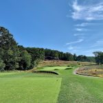 Panoramic view of a lush green golf course at North Jersey Country Club. Smooth