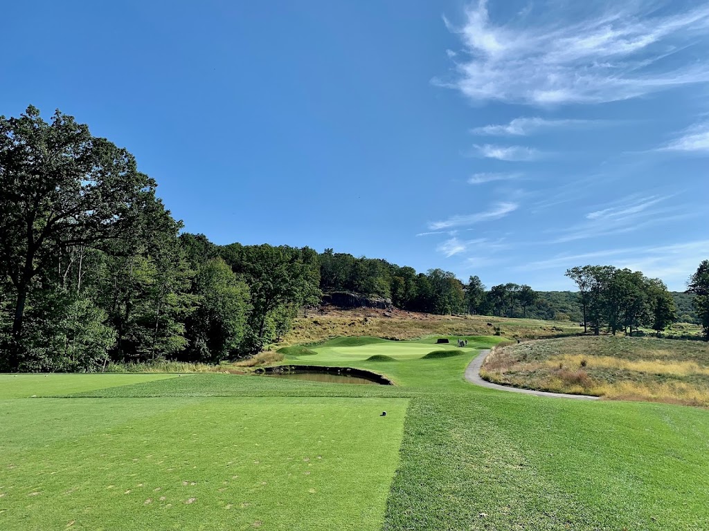 Panoramic view of a lush green golf course at North Jersey Country Club. Smooth