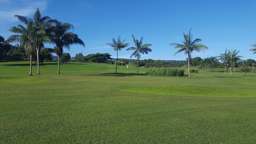 Panoramic view of a lush green golf course at North Kohala Golf Park. Smooth