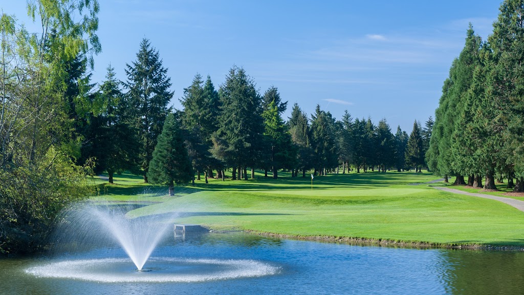 Panoramic view of a lush green golf course at North Shore Golf Course. Smooth