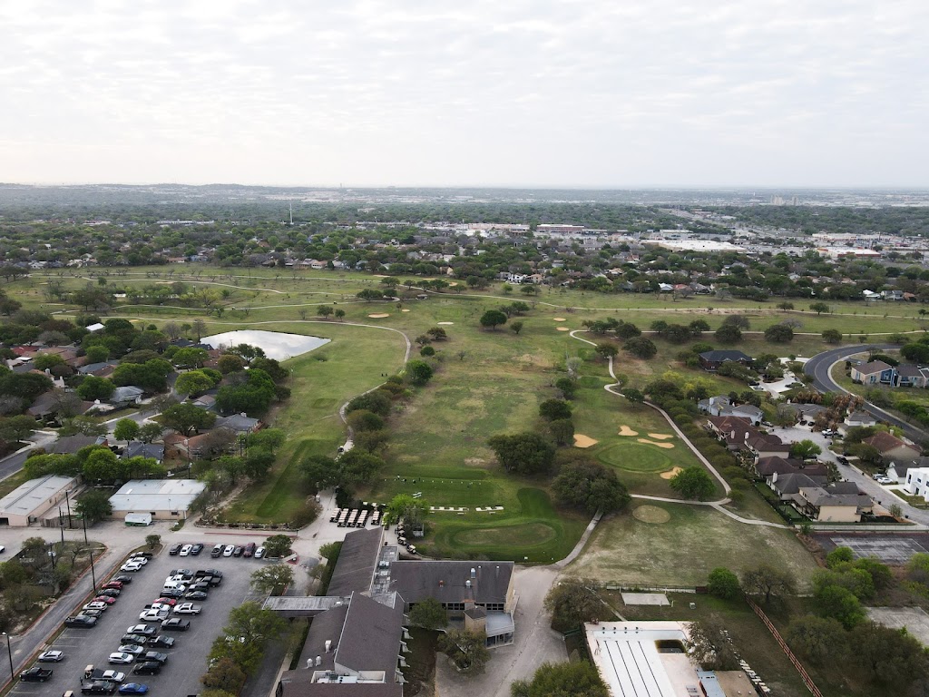 Panoramic view of a lush green golf course at Northern Hills Golf Club. Smooth