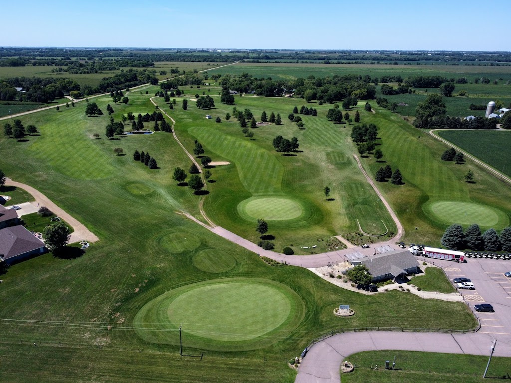 Panoramic view of a lush green golf course at Northern Links Golf Course. Smooth