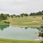 Panoramic view of a lush green golf course at Northridge Country Club. Smooth