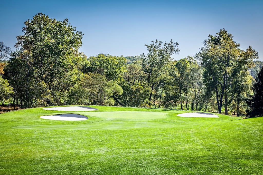 Panoramic view of a lush green golf course at Northwest Golf Course. Smooth