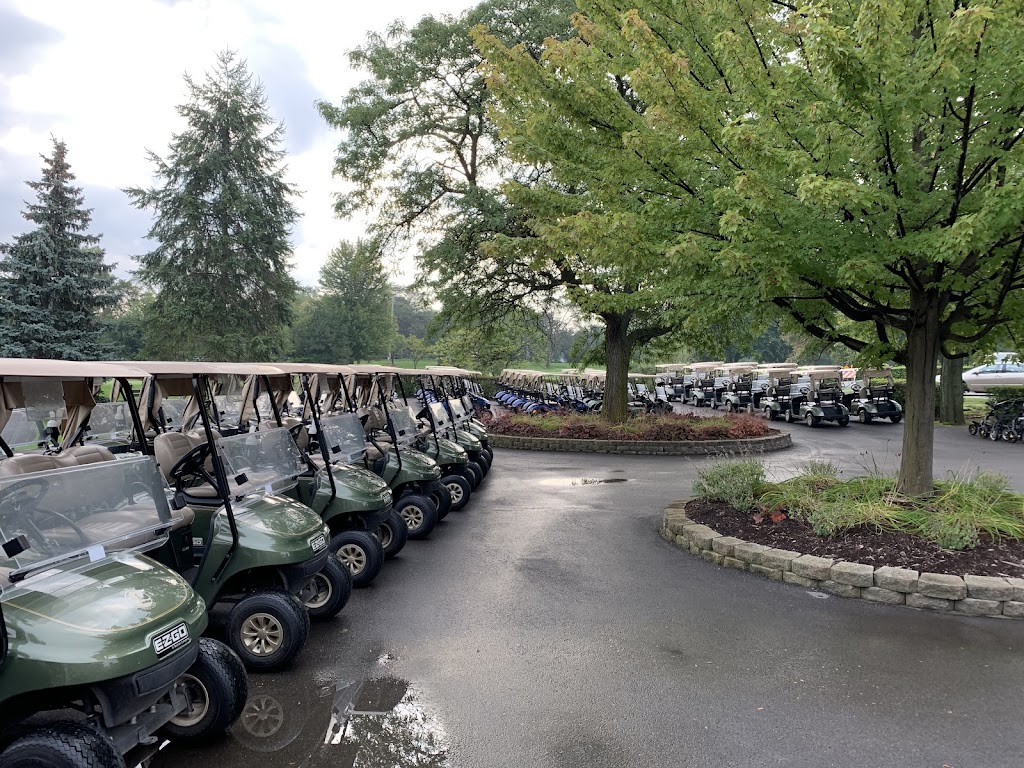 Panoramic view of a lush green golf course at Oak Brook Golf Club. Smooth