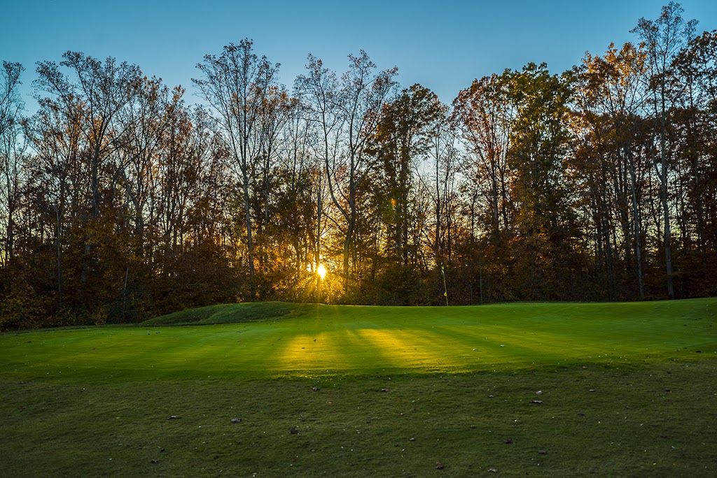 Panoramic view of a lush green golf course at Oak Creek Golf Club. Smooth