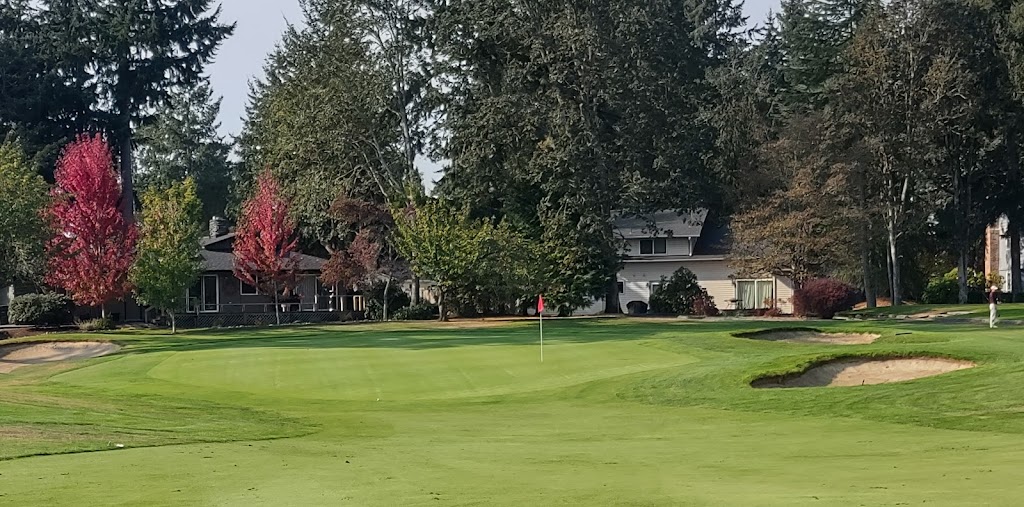 Panoramic view of a lush green golf course at Oakbrook Golf Club. Smooth