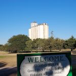 Panoramic view of a lush green golf course at Oakley Country Club. Smooth