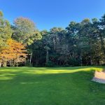 Panoramic view of a lush green golf course at Ocean County Golf Course at Forge Pond. Smooth