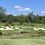 Panoramic view of a lush green golf course at Ohio State University Golf Club. Smooth