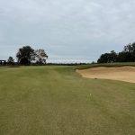 Panoramic view of a lush green golf course at Ohoopee Match Club. Smooth